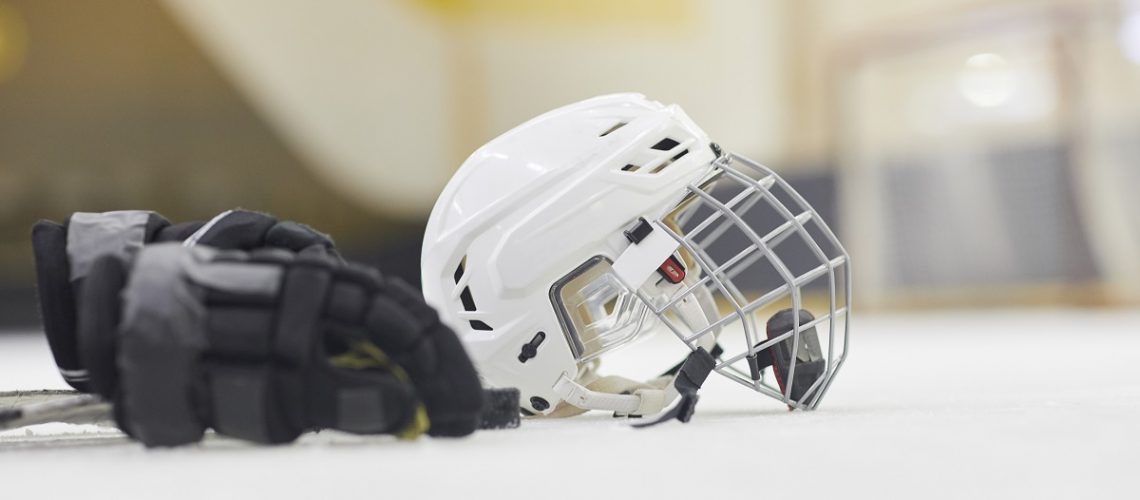 Ice hockey mask and gloves.