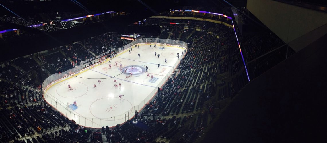 Ice hockey, viewed from above.