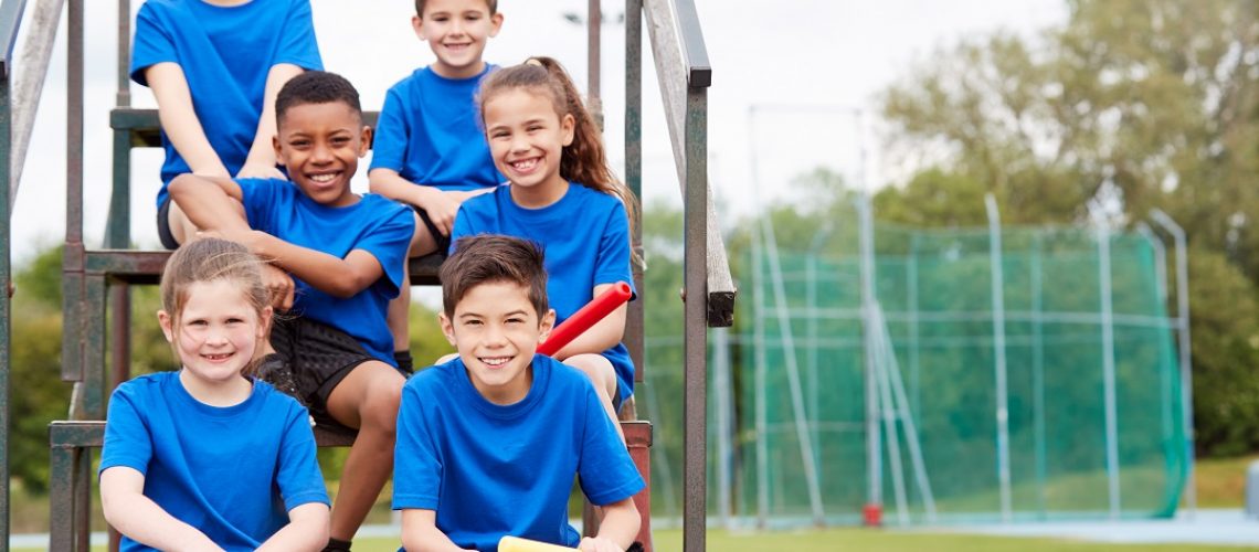 Youth athletes on a riser