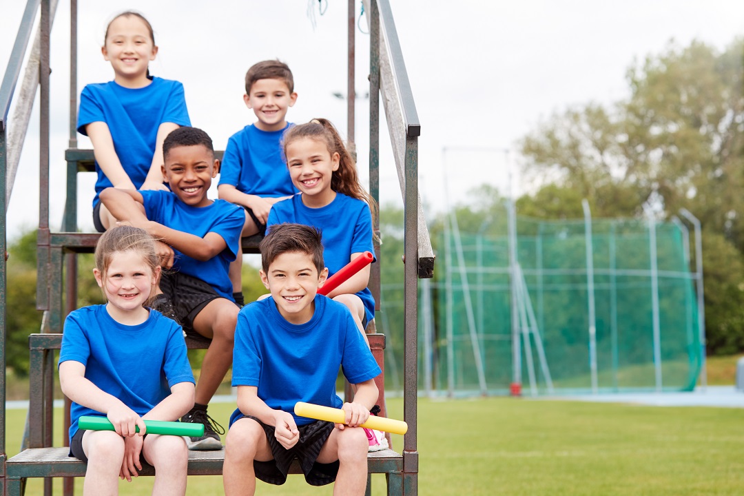 Youth athletes on a riser