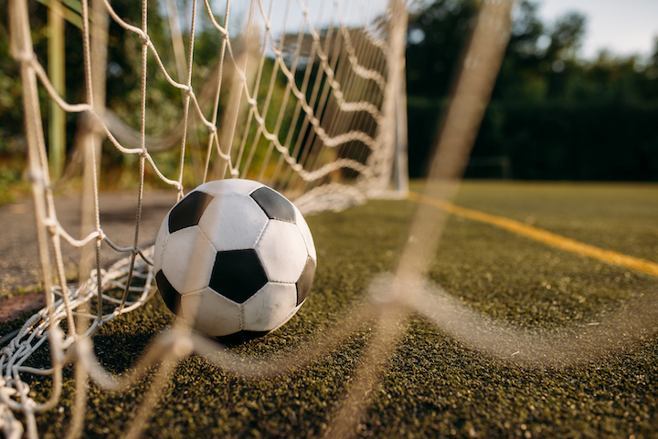 Soccer ball inside training net