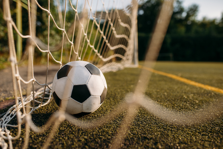 Soccer ball inside training net