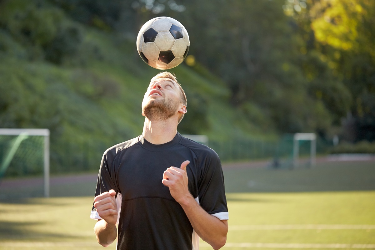 Soccer player practicing headers