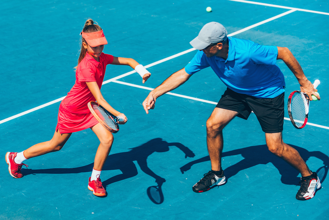 Tennis coach and player