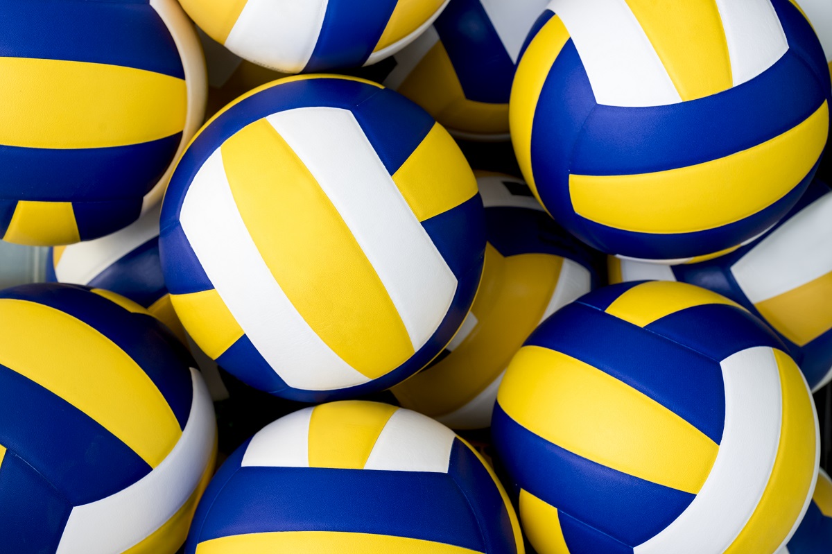 Many volleyballs.